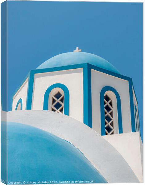 Santorini Blue Domed Church at Kamari Canvas Print by Antony McAulay