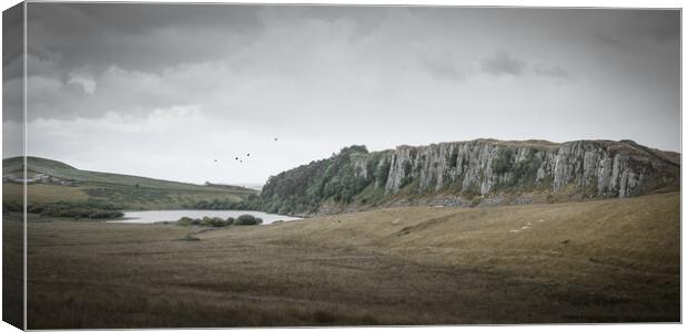 The Whin Sill at Crag Lough Canvas Print by Mark Jones