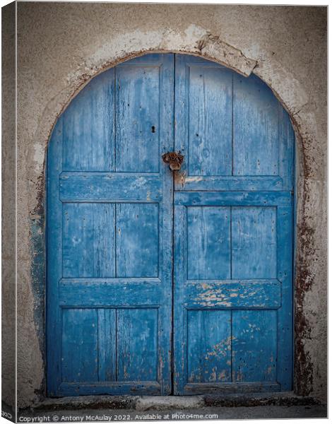 Weathered Blue Door Canvas Print by Antony McAulay