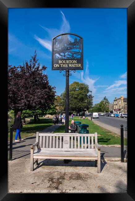 Vacant seat High Street Bourton-on-the-Water. Framed Print by Allan Bell