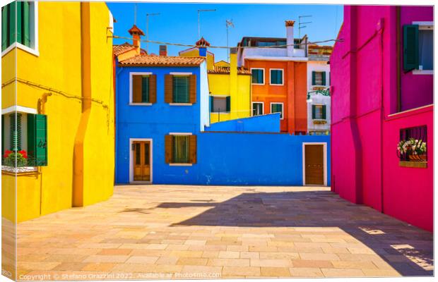 Burano island square and colourful houses, Venice, Italy Canvas Print by Stefano Orazzini