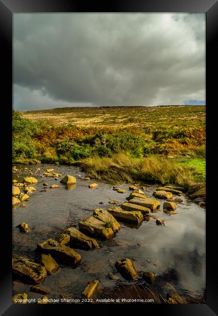 Stepping Stones over Wheeldale Beck, North Yorkshi Framed Print by Michael Shannon
