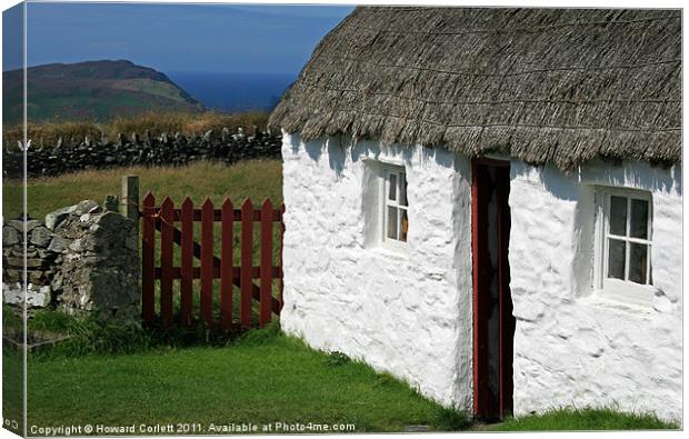 Manx thatched cottage Canvas Print by Howard Corlett