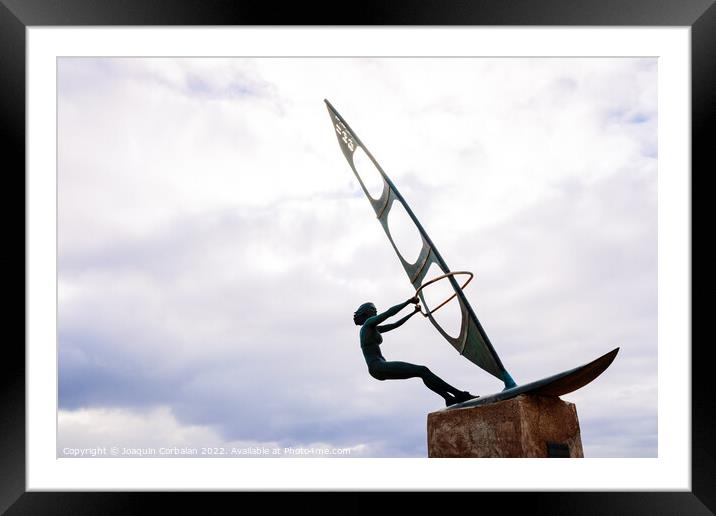 Gran Canaria, spain - January 12, 2022: Sculpture of a surfer wo Framed Mounted Print by Joaquin Corbalan