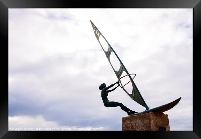 Gran Canaria, spain - January 12, 2022: Sculpture of a surfer wo Framed Print by Joaquin Corbalan