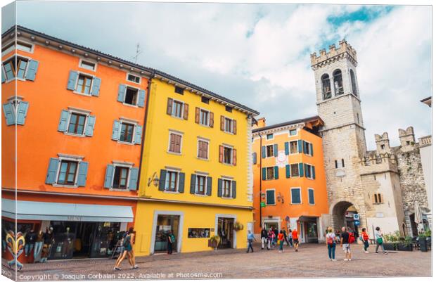 Riva del Garda, Italy - September 22, 2021: Colorful streets of  Canvas Print by Joaquin Corbalan