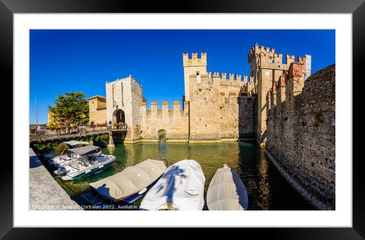 Sirmione, Italy - September 28, 2021: Boats moored next to Sirmi Framed Mounted Print by Joaquin Corbalan