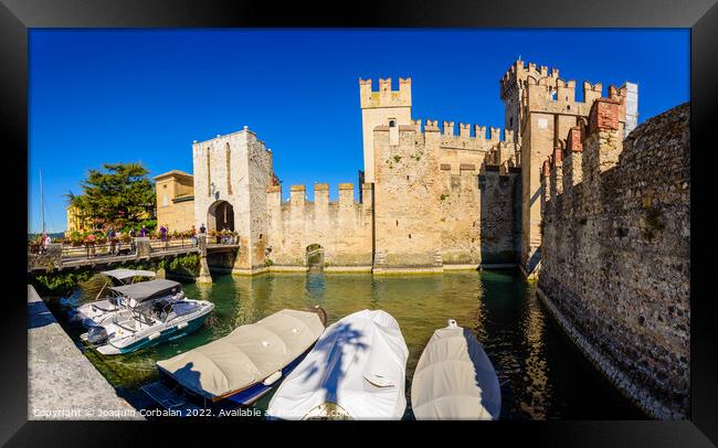 Sirmione, Italy - September 28, 2021: Boats moored next to Sirmi Framed Print by Joaquin Corbalan