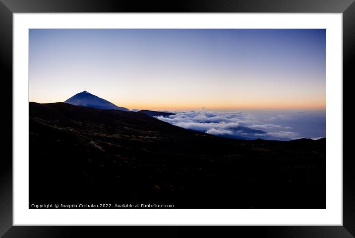 Relaxing sea of clouds at sunset in the hills near Mount Teide Framed Mounted Print by Joaquin Corbalan
