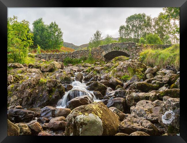Ashness Bridge over small stream in Lake District Framed Print by Steve Heap