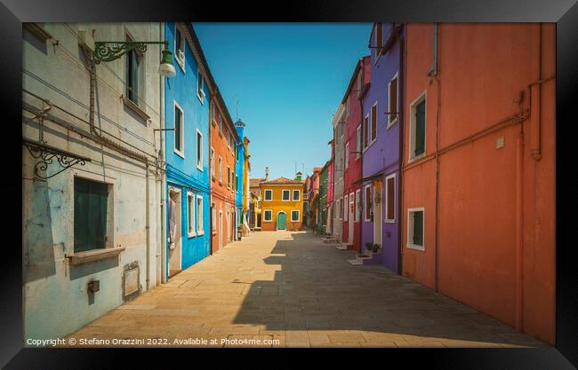 Burano island street, colorful houses in Venetian lagoon  Framed Print by Stefano Orazzini