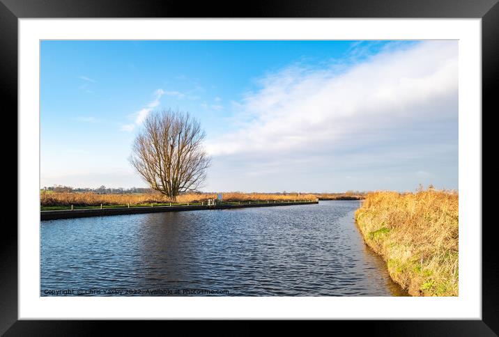 A view down the River Ant, Norfolk Broads. Framed Mounted Print by Chris Yaxley