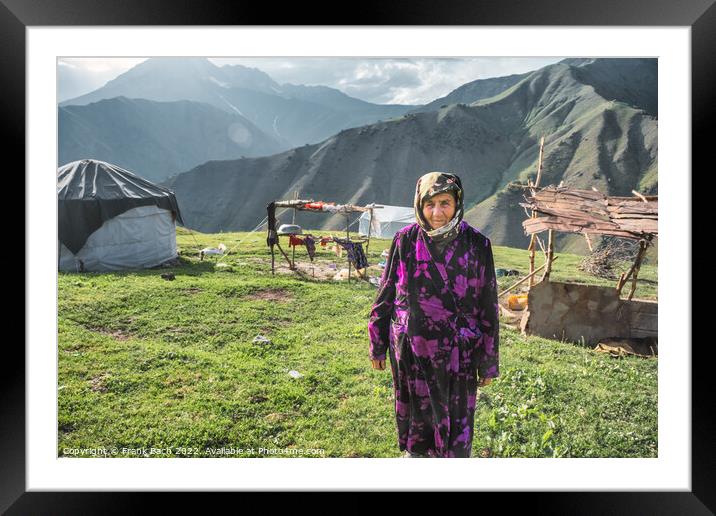 Old woman outside her yurt in the mountains of Kyrgyztan Framed Mounted Print by Frank Bach