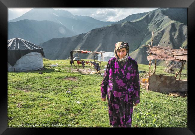 Old woman outside her yurt in the mountains of Kyrgyztan Framed Print by Frank Bach