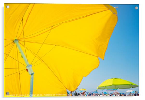 Beach holiday background, with a large yellow umbrella in the fo Acrylic by Joaquin Corbalan