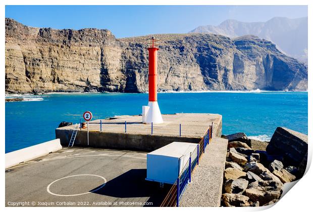 Entrance to the mouth of the port of Agaete with the beautiful c Print by Joaquin Corbalan