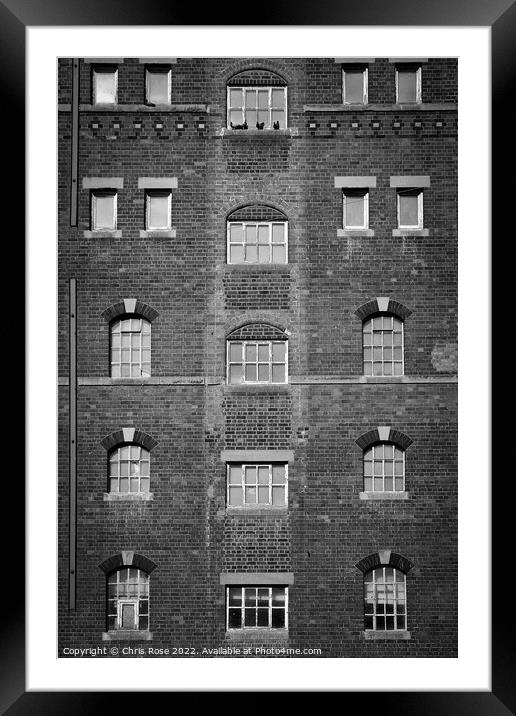Brick wall and windows pattern Framed Mounted Print by Chris Rose
