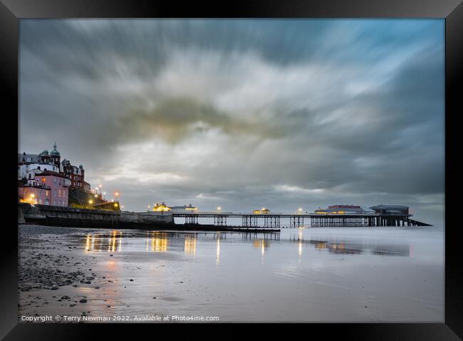 A Winters Evening on Cromer Pier Framed Print by Terry Newman