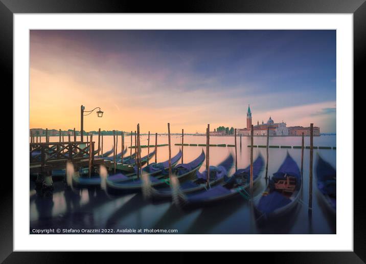 Venice lagoon, San Giorgio church and gondolas at sunrise. Italy Framed Mounted Print by Stefano Orazzini
