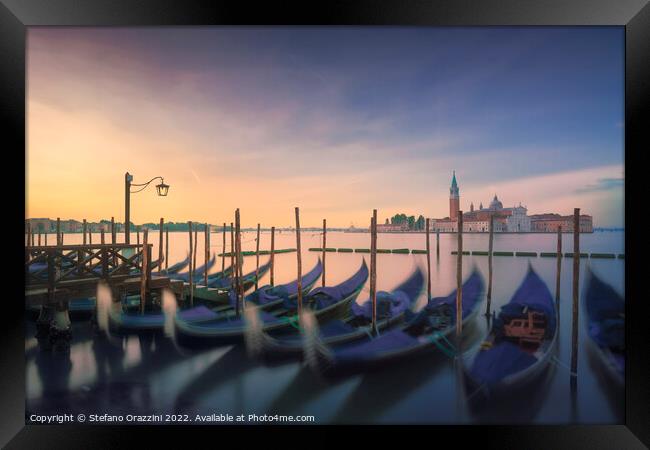Venice lagoon, San Giorgio church and gondolas at sunrise. Italy Framed Print by Stefano Orazzini