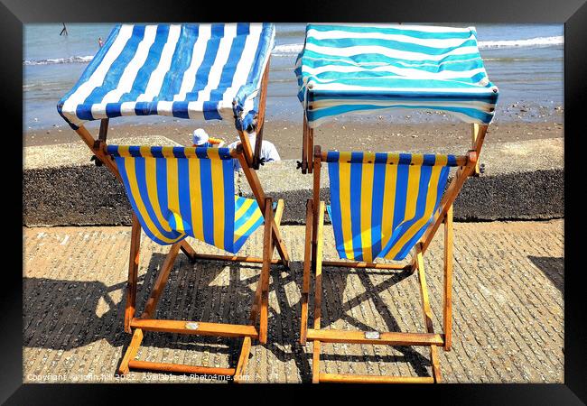 Sunshade deckchairs, Shanklin, Isle of Wight, UK. Framed Print by john hill