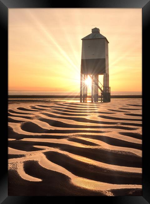 Low Lighthouse Sunbeams Framed Print by David Neighbour