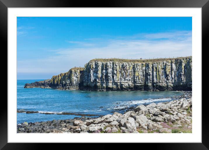 Sea cliffs at Castle Point, Dunstanburgh Framed Mounted Print by Keith Douglas