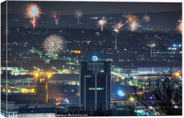 Fireworks over Blackburn on New Years Day Canvas Print by Shafiq Khan