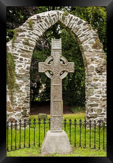 Celtic cross and stone arch Ireland Framed Print by Phil Crean