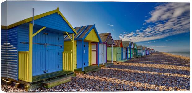 Colourful Beach Huts on Herne Bay beach Kent Canvas Print by John Gilham