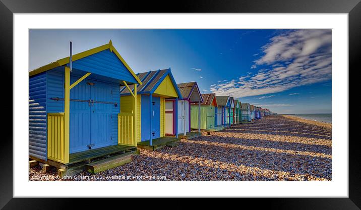 Colourful Beach Huts on Herne Bay beach Kent Framed Mounted Print by John Gilham