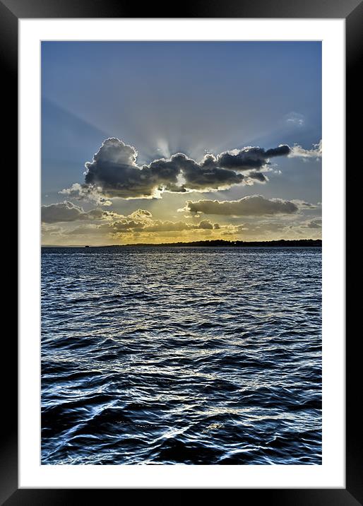Solent sun rays Framed Mounted Print by Gary Eason