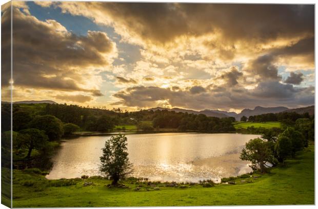 Sunset at Loughrigg Tarn in Lake District Canvas Print by Steve Heap