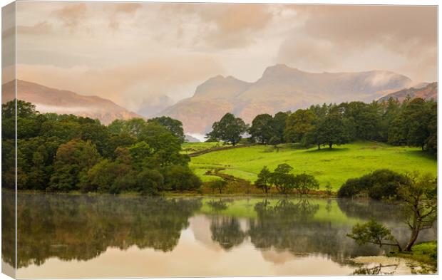 Sunrise at Loughrigg Tarn in Lake District Canvas Print by Steve Heap