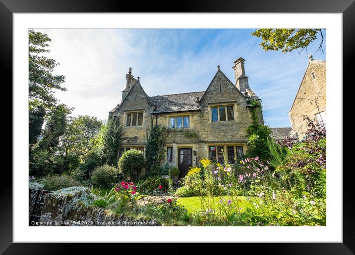 Riverside house and garden Bourton-on-the-Water. Framed Mounted Print by Allan Bell