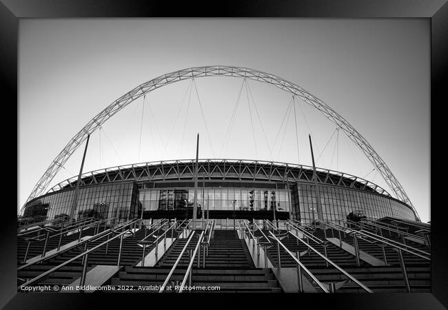 Wembley Stadium in black and white Framed Print by Ann Biddlecombe