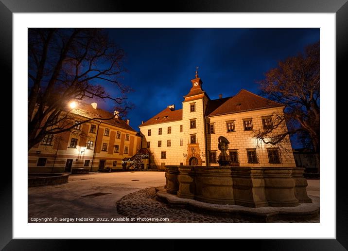 Winter night at the Courtyard of Trebon Castle - Czech Republic. Framed Mounted Print by Sergey Fedoskin