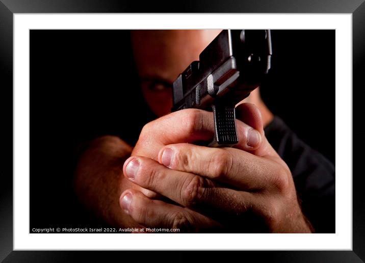 gun point Framed Mounted Print by PhotoStock Israel