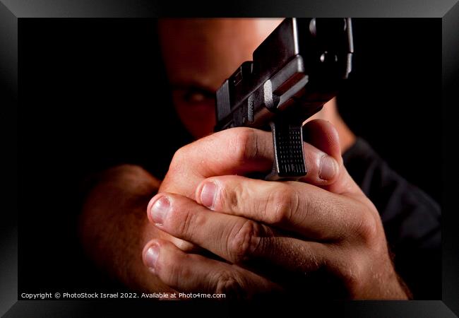 gun point Framed Print by PhotoStock Israel