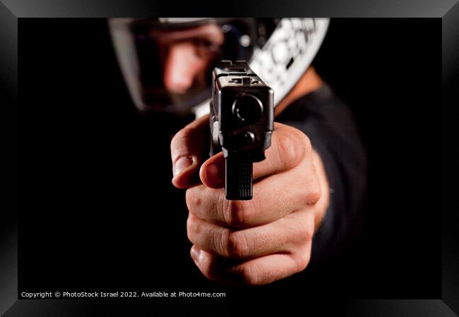 gun point Framed Print by PhotoStock Israel