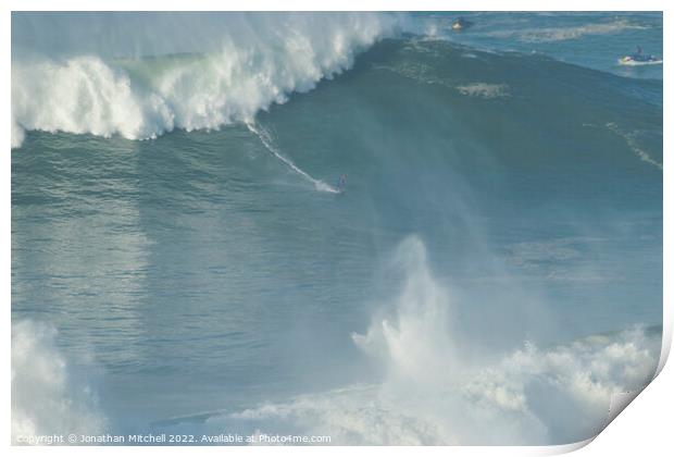 Surfer on a XXL wave at Nazare Portugal Print by Jonathan Mitchell