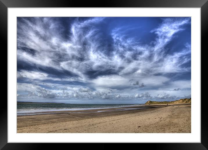 Swirling clouds and blue skies over Saunton Devon Framed Mounted Print by Mike Gorton