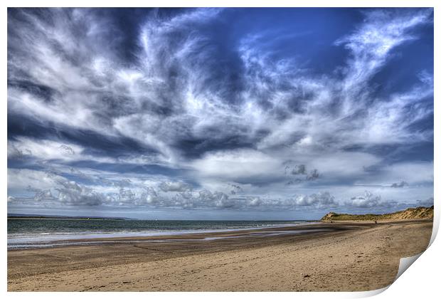 Swirling clouds and blue skies over Saunton Devon Print by Mike Gorton