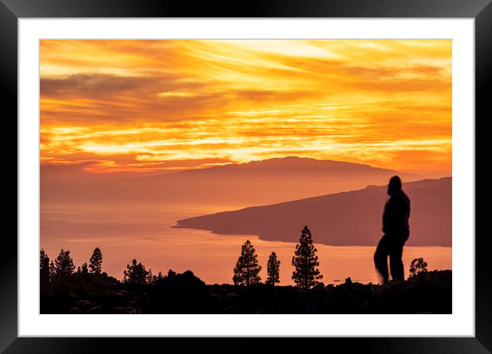 Tourists watch dramatic sunset from Tenerife Framed Mounted Print by Phil Crean