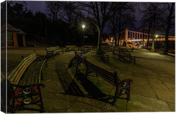 Benches at the River Dee Canvas Print by Paul Madden