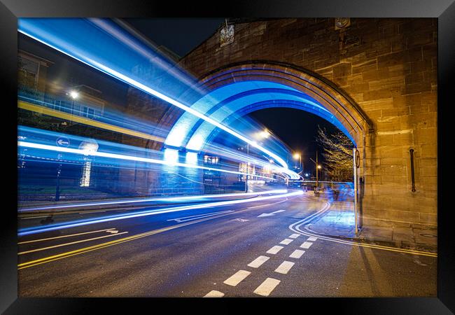 Long exposure of a bus in Chester Framed Print by Paul Madden