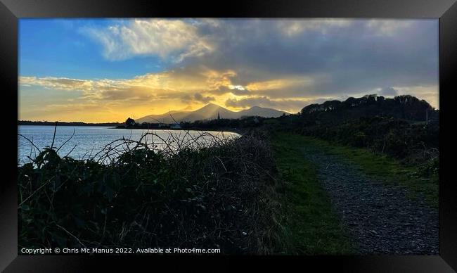 Sunbeams behind Mourne Mountains  Framed Print by Chris Mc Manus