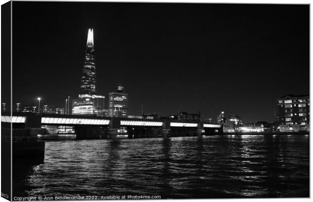 Black and white Reflections on the Thames Canvas Print by Ann Biddlecombe