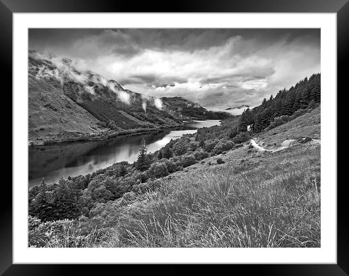 Rain clearing over the loch Framed Mounted Print by Gary Eason
