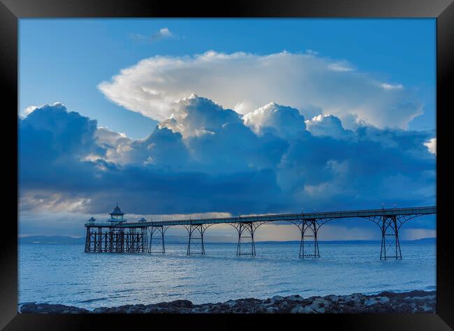 Clevedon Pier with large cumulus cloud Framed Print by Rory Hailes